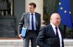 Emmanuel Macron et Michel Sapin à la sortie du conseil des ministres