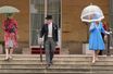 Le prince Charles encadré de la princesse Anne et de Camilla Parker-Bowles à Buckingham Palace, le 11 mai 2022