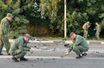 Les enquêteurs sur le lieux de l'explosion, dimanche, en Russie.