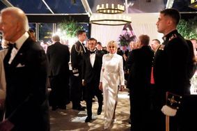 Emmanuel et Brigitte Macron au dîner d'Etat en leur honneur donné dans les jardins de la Maison blanche. 