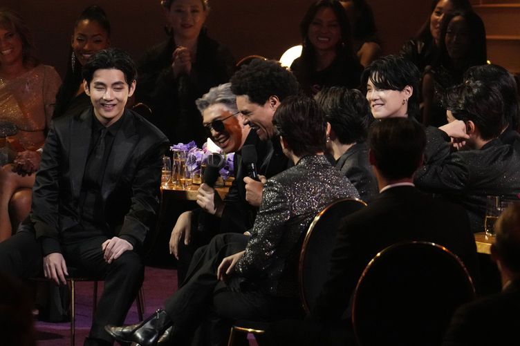 BTS and the presenter of the evening, Trevor Noah.