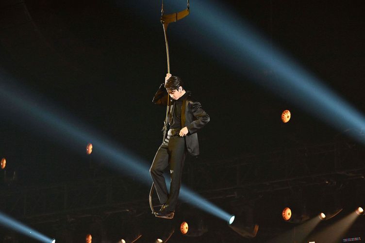 Jungkook arrives by air for BTS' performance at the Grammy Awards on Sunday night.